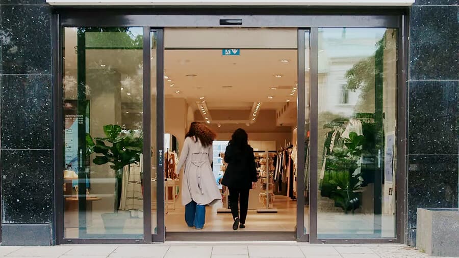 Modern automatic sliding glass retail entrance