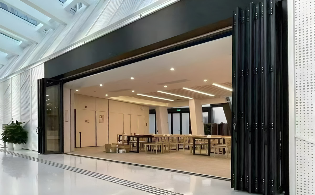 Fully Opened Multi Panel Commercial Folding Glass Door System in Event Hall