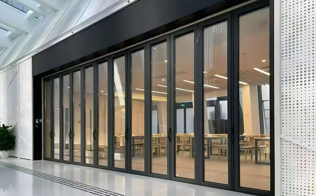 Closed Multi Panel Commercial Folding Door Creating Transparent Interior Partition