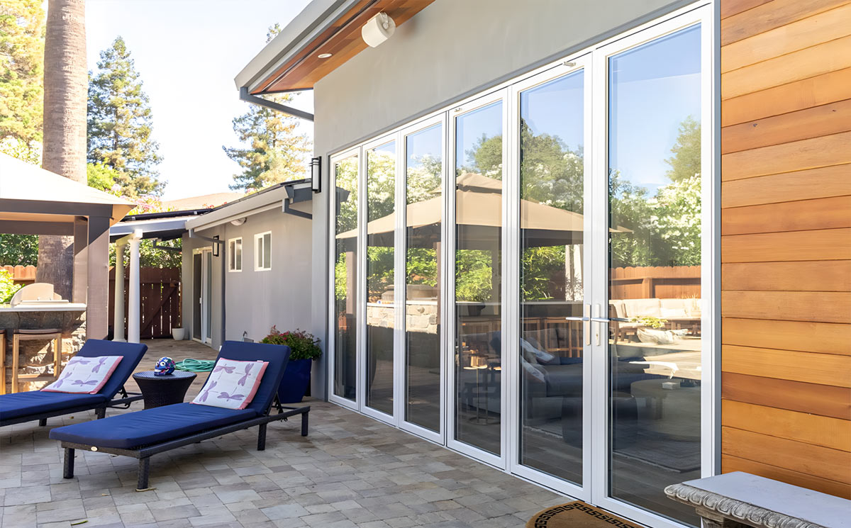 Multi Panel Commercial Folding Glass Door System Closed Position Functioning as Acoustic Partition Multi Panel Commercial Folding Glass Door System Closed Position Functioning as Acoustic Partition