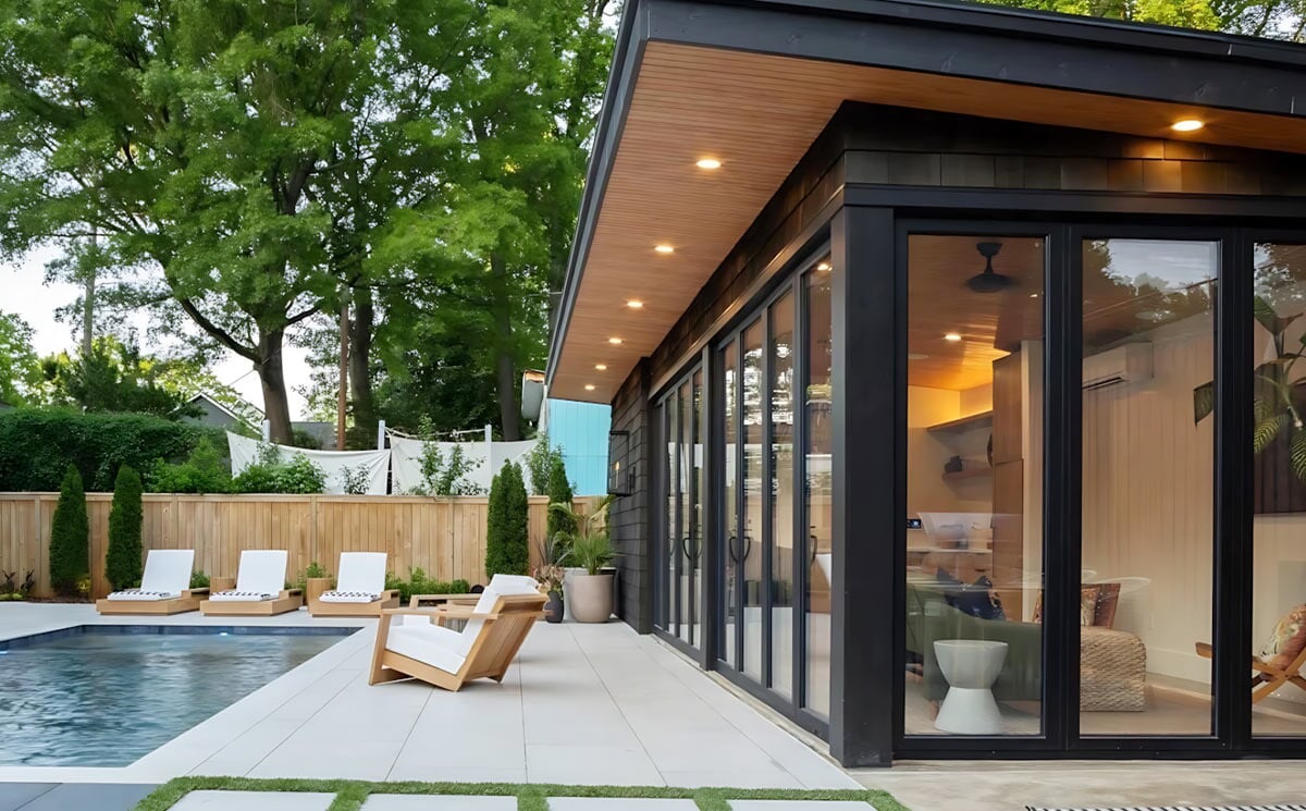 Luxury Villa Living Room Featuring Corner Folding Glass Door System with Panoramic Green View Luxury Villa Living Room Featuring Corner Folding Glass Door System with Panoramic Green View