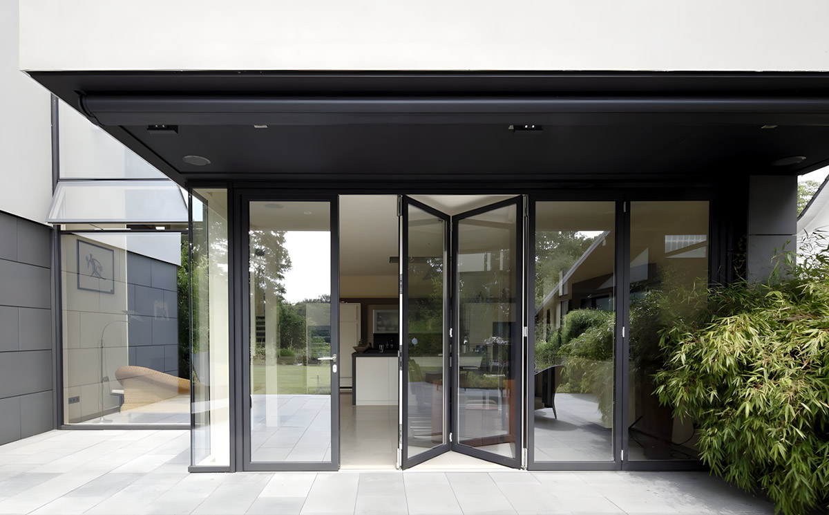 Expansive Commercial Venue Wall Retracted with Multi Panel Bifold Glass Doors