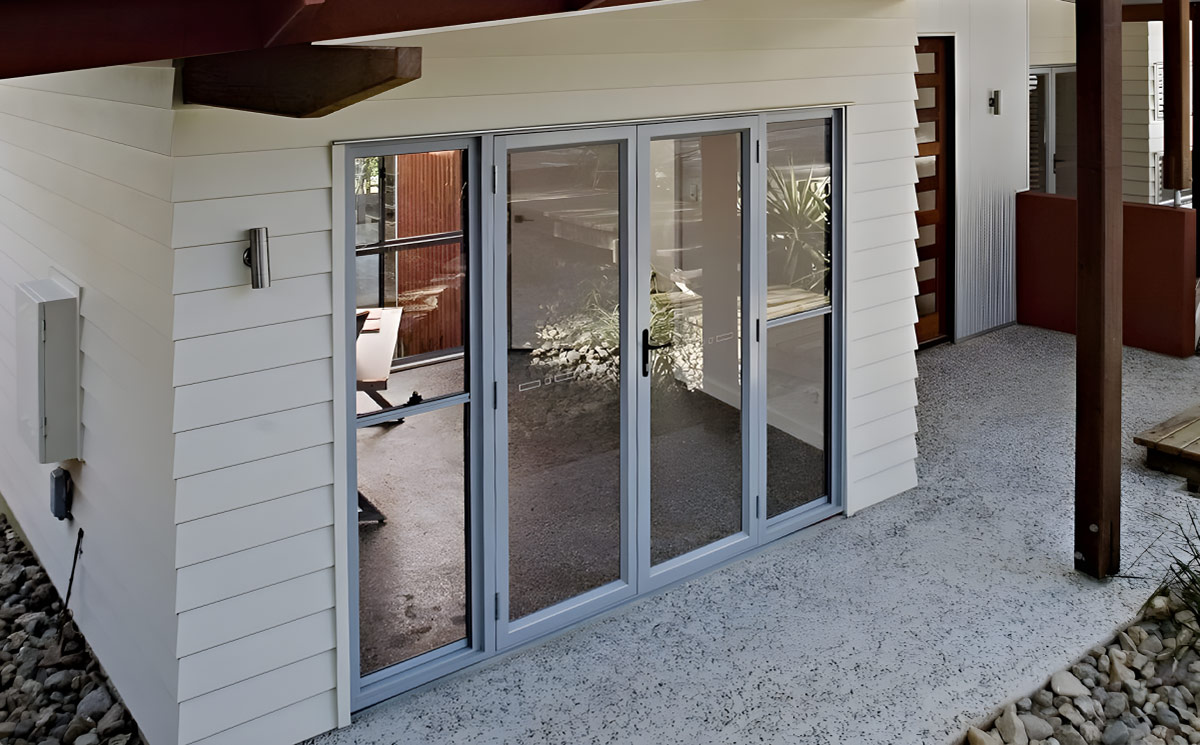 Modern aluminum French doors with dark slim profiles and full-vision glass panes