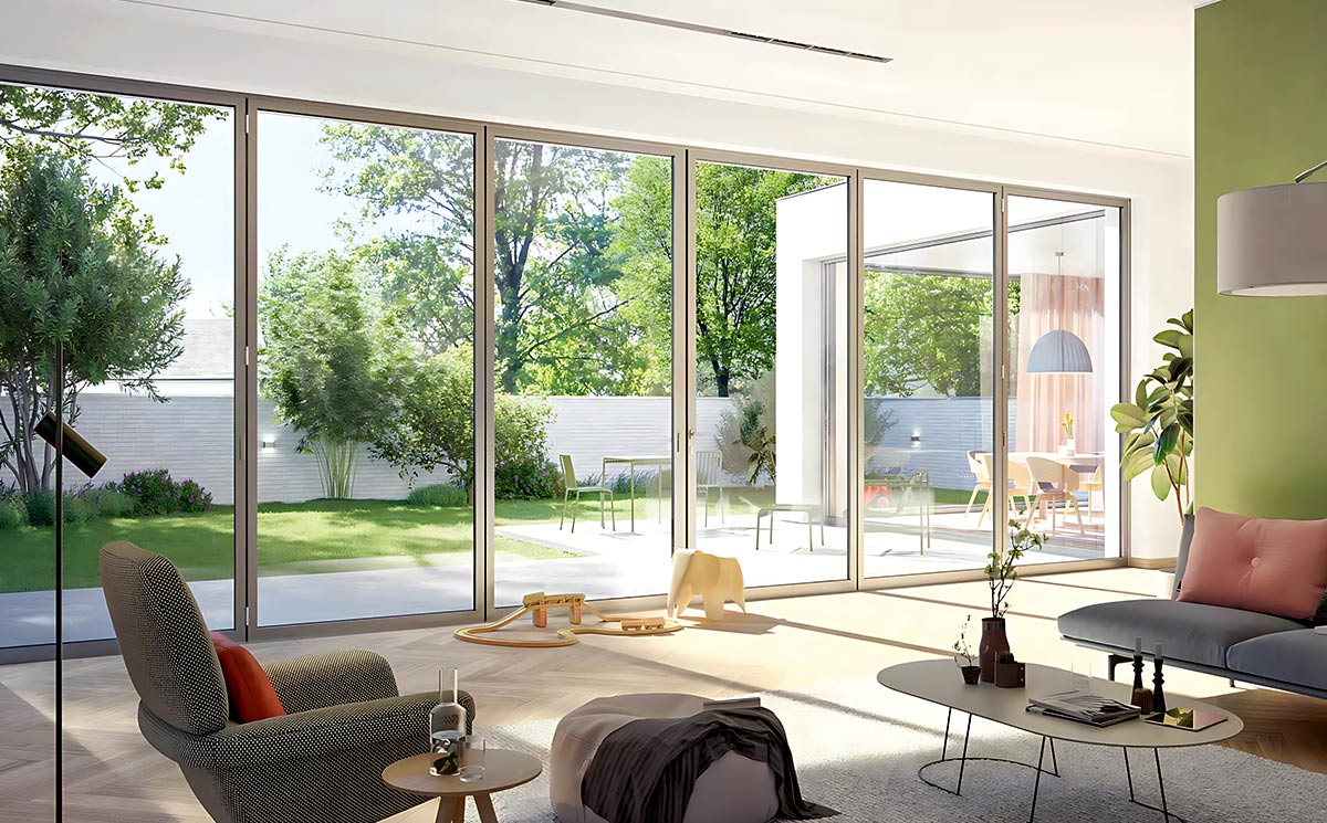 Closed ultra-slim frame glass doors in a bright living room offering unobstructed views of a sunny green garden